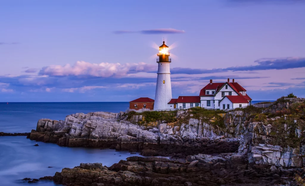 New England lighthouse on a rocky coast